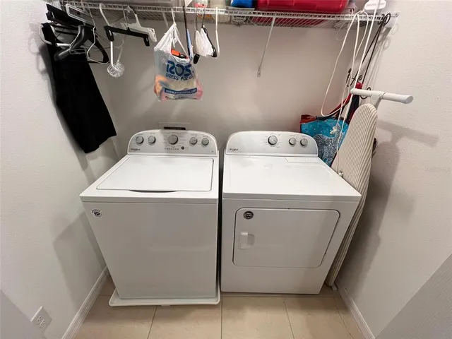 a room with gym equipment and a large window