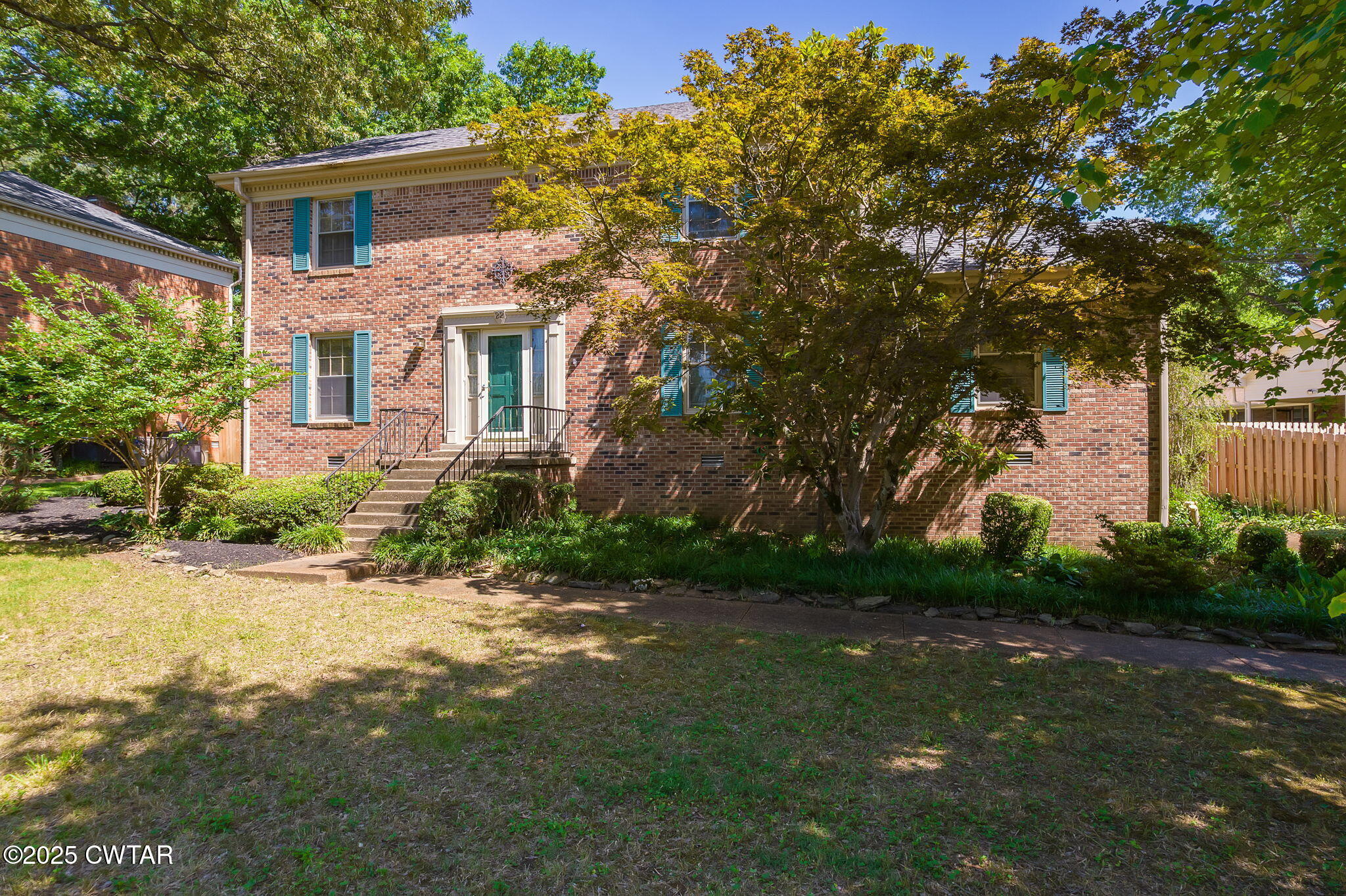 22 Bethany Drive Jackson, TN 38301 - Photo 2 of 32 a front view of house with yard and green space