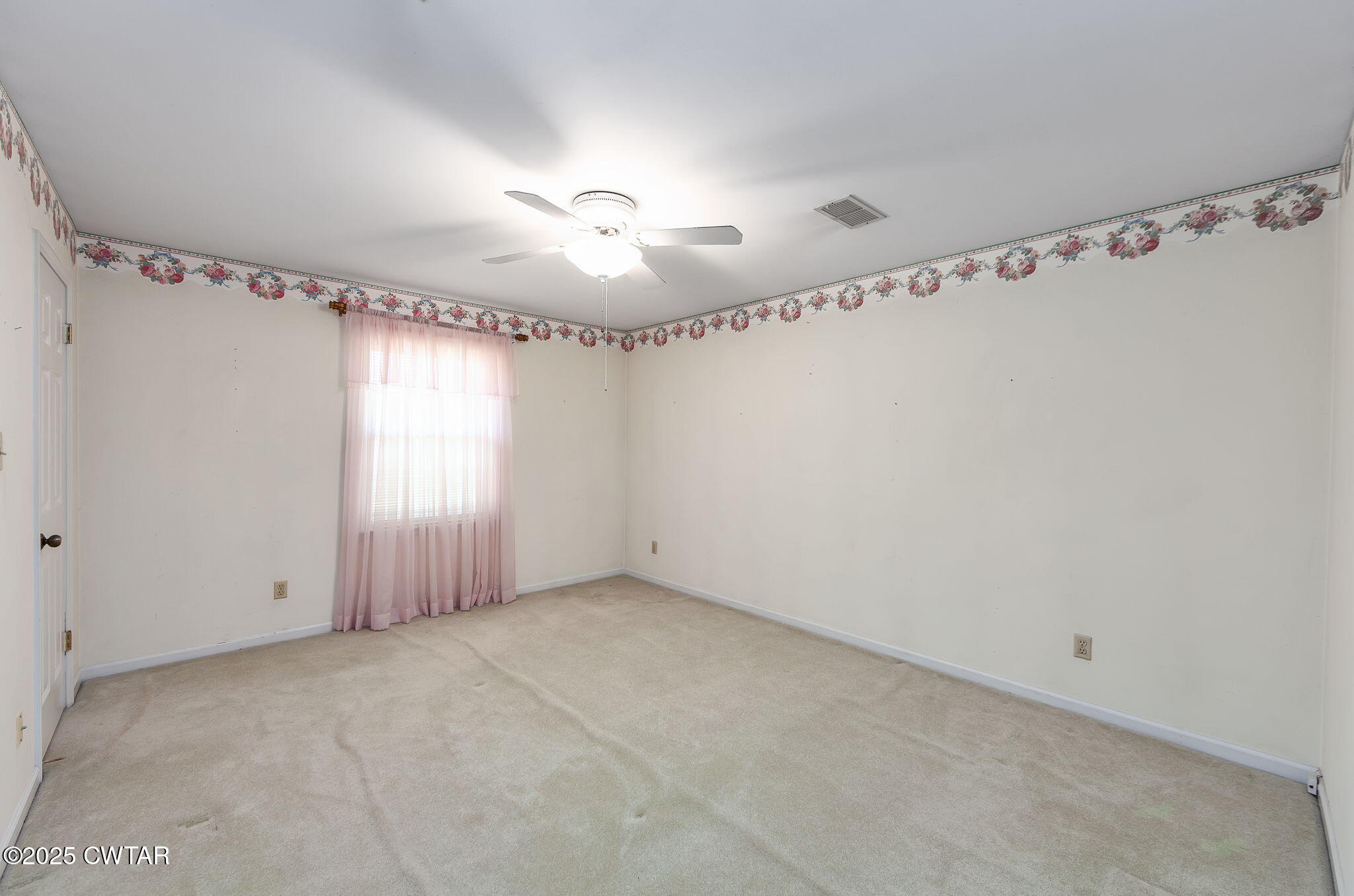 22 Bethany Drive Jackson, TN 38301 - Photo 23 of 32 a view of a room with window and a ceiling fan