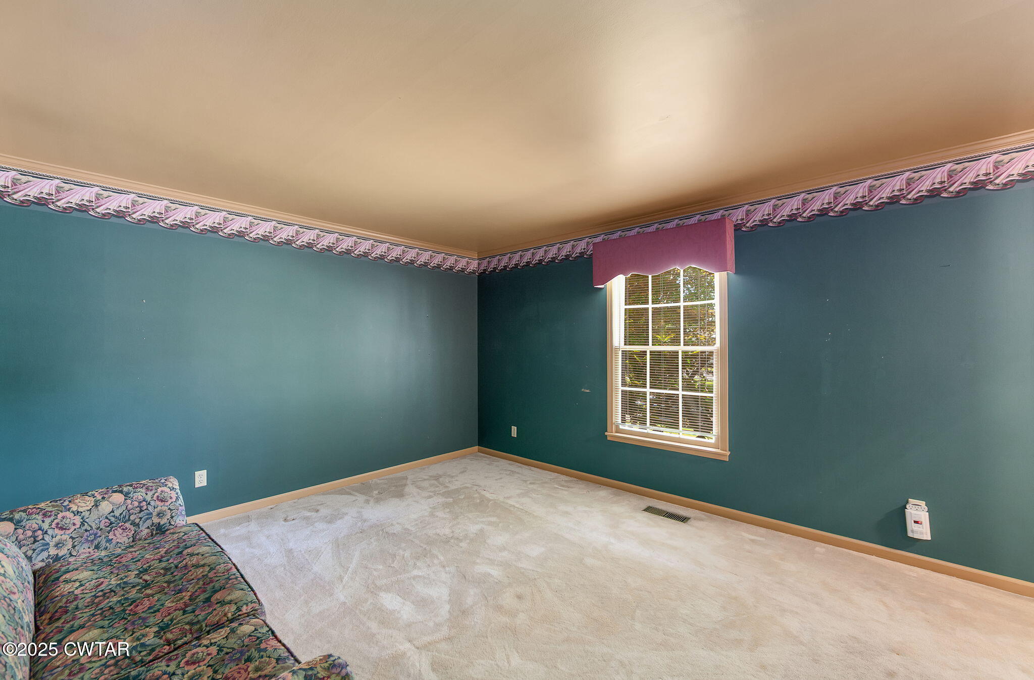 22 Bethany Drive Jackson, TN 38301 - Photo 5 of 32 a bedroom with a bed and a window