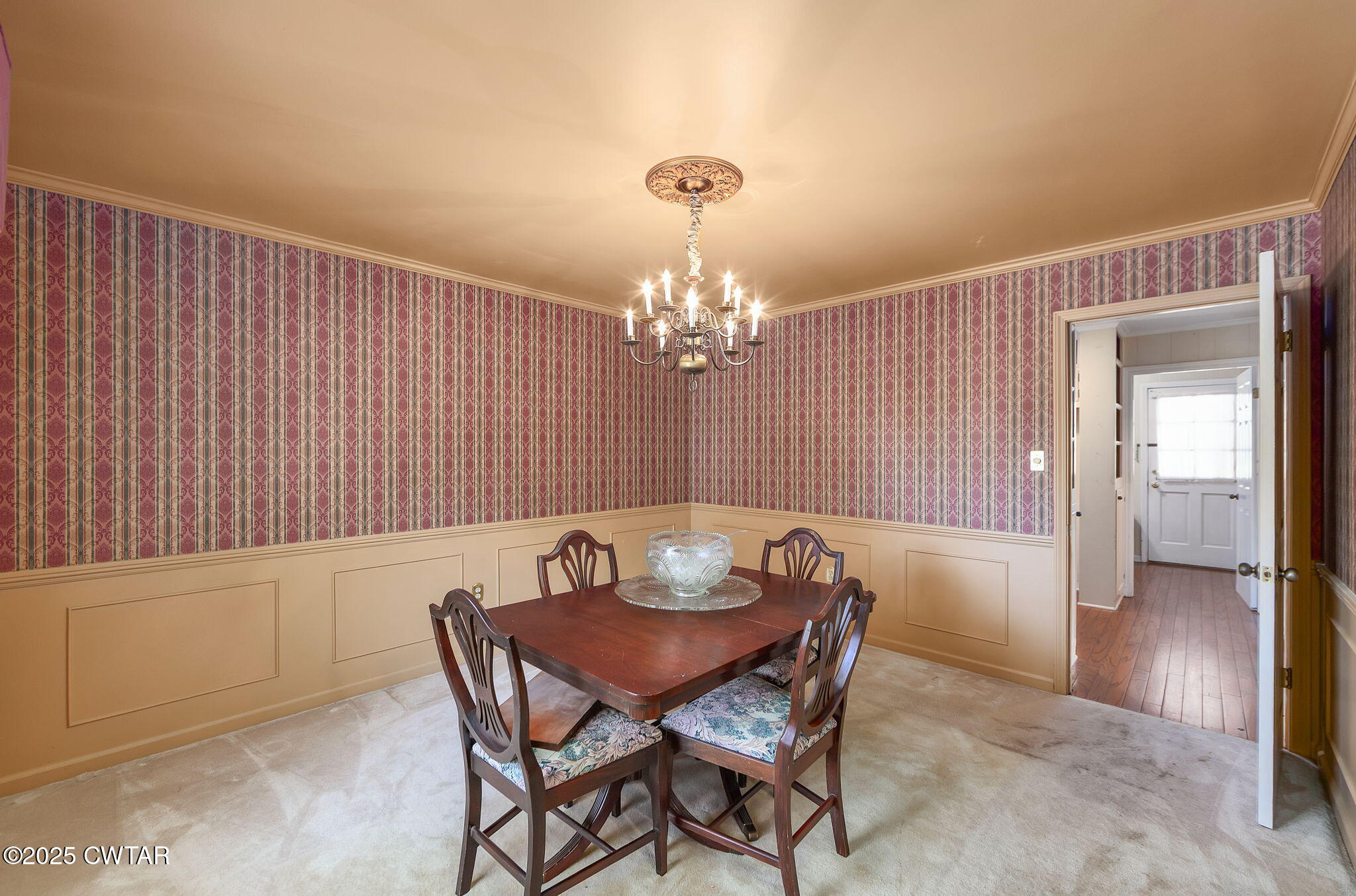 22 Bethany Drive Jackson, TN 38301 - Photo 7 of 32 a view of a dining room with furniture and chandelier