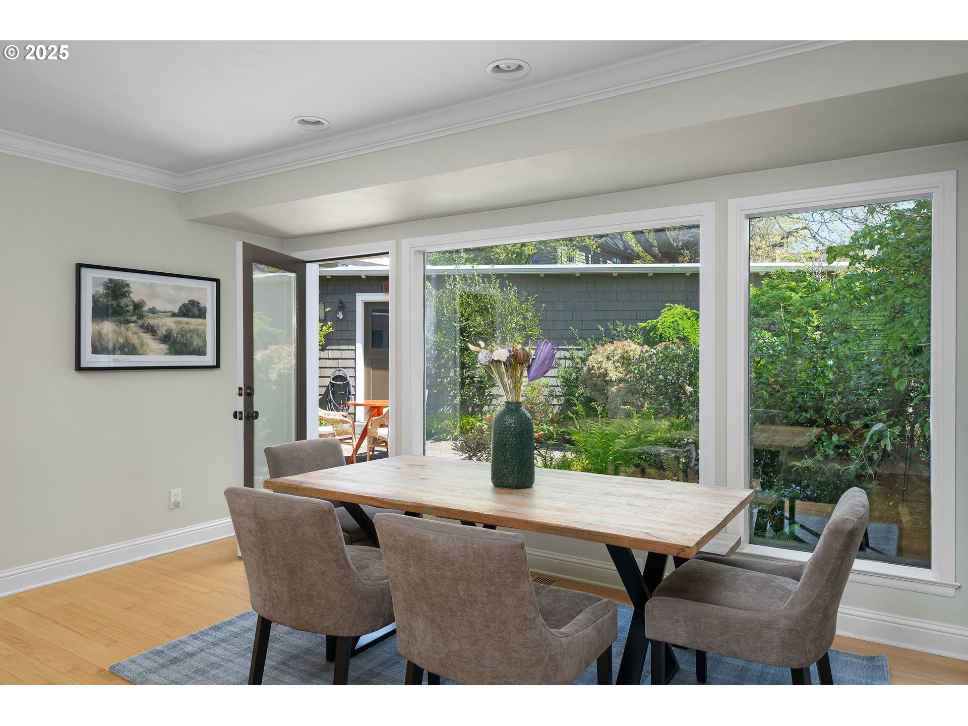 3940 Southwest Council Crest Drive Portland, OR 97239 - Photo 12 of 48 a dining room with furniture and a large window
