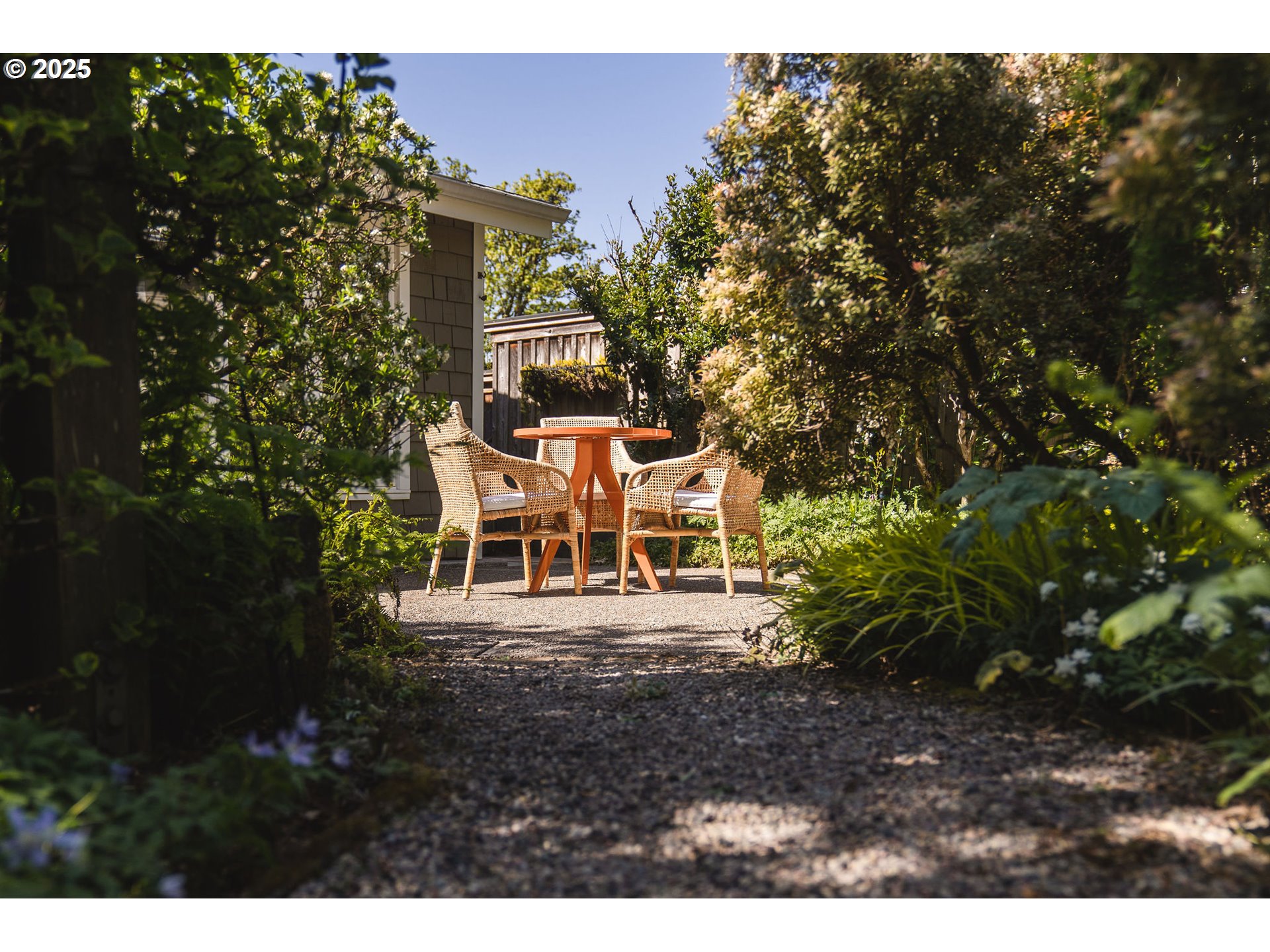 3940 Southwest Council Crest Drive Portland, OR 97239 - Photo 13 of 48 a lawn chairs sitting in a backyard