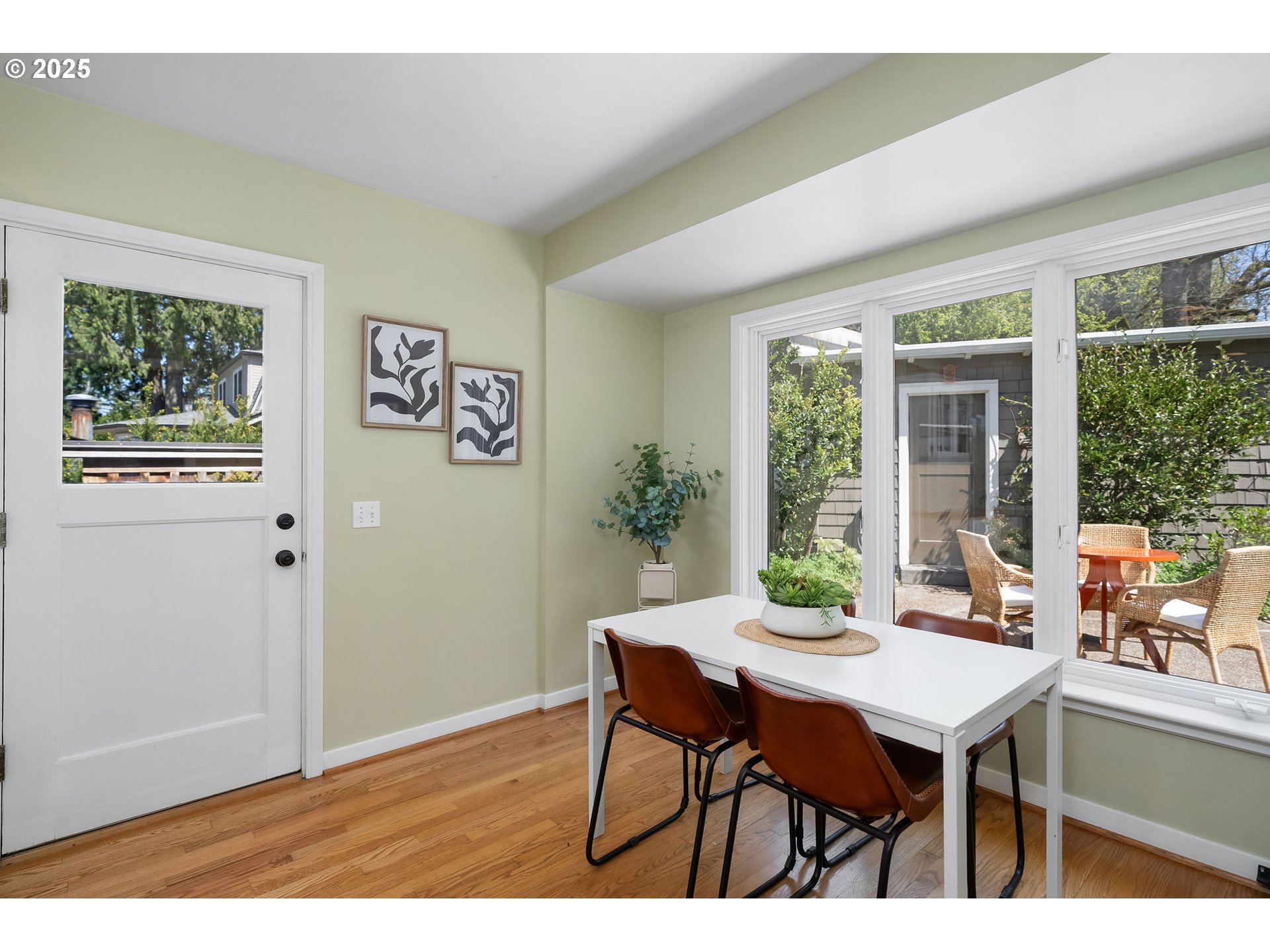 3940 Southwest Council Crest Drive Portland, OR 97239 - Photo 15 of 48 a view of a dining room with furniture window and outside view