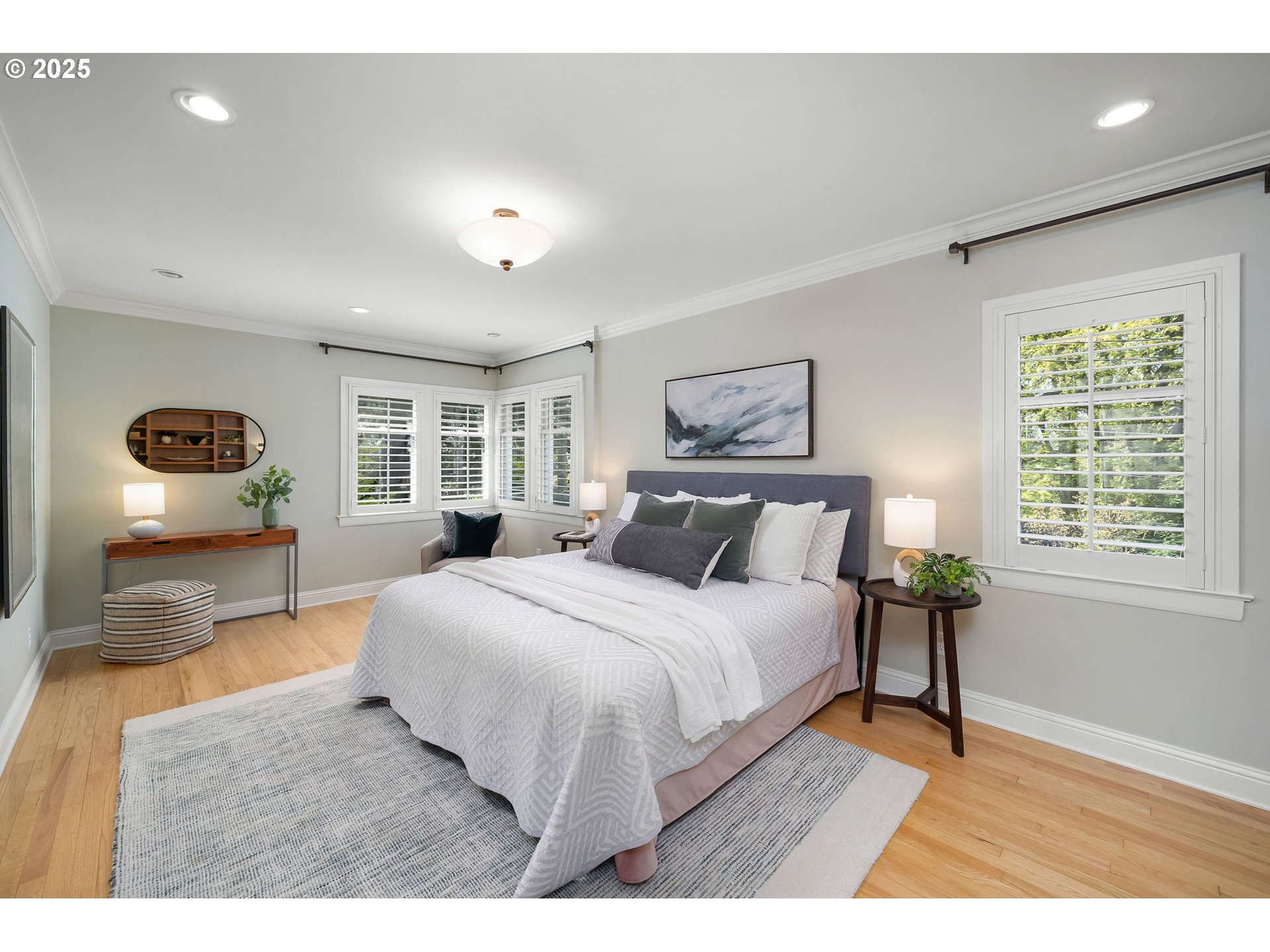 3940 Southwest Council Crest Drive Portland, OR 97239 - Photo 25 of 48 a bedroom with a large bed and a window