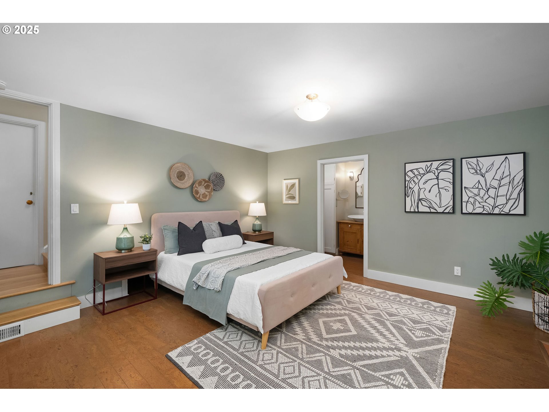 3940 Southwest Council Crest Drive Portland, OR 97239 - Photo 29 of 48 a bedroom with a bed and a lamp on dresser