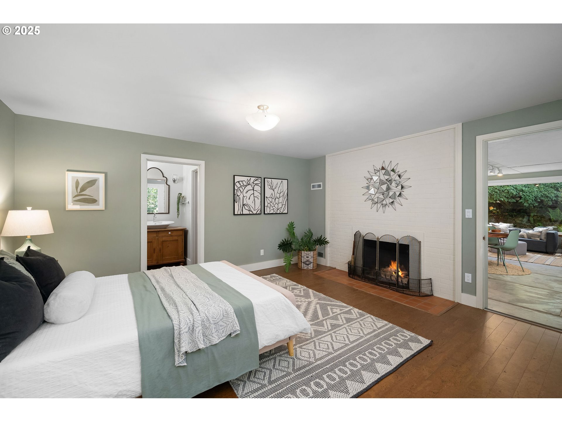 3940 Southwest Council Crest Drive Portland, OR 97239 - Photo 31 of 48 a bed room with a bed and a fireplace