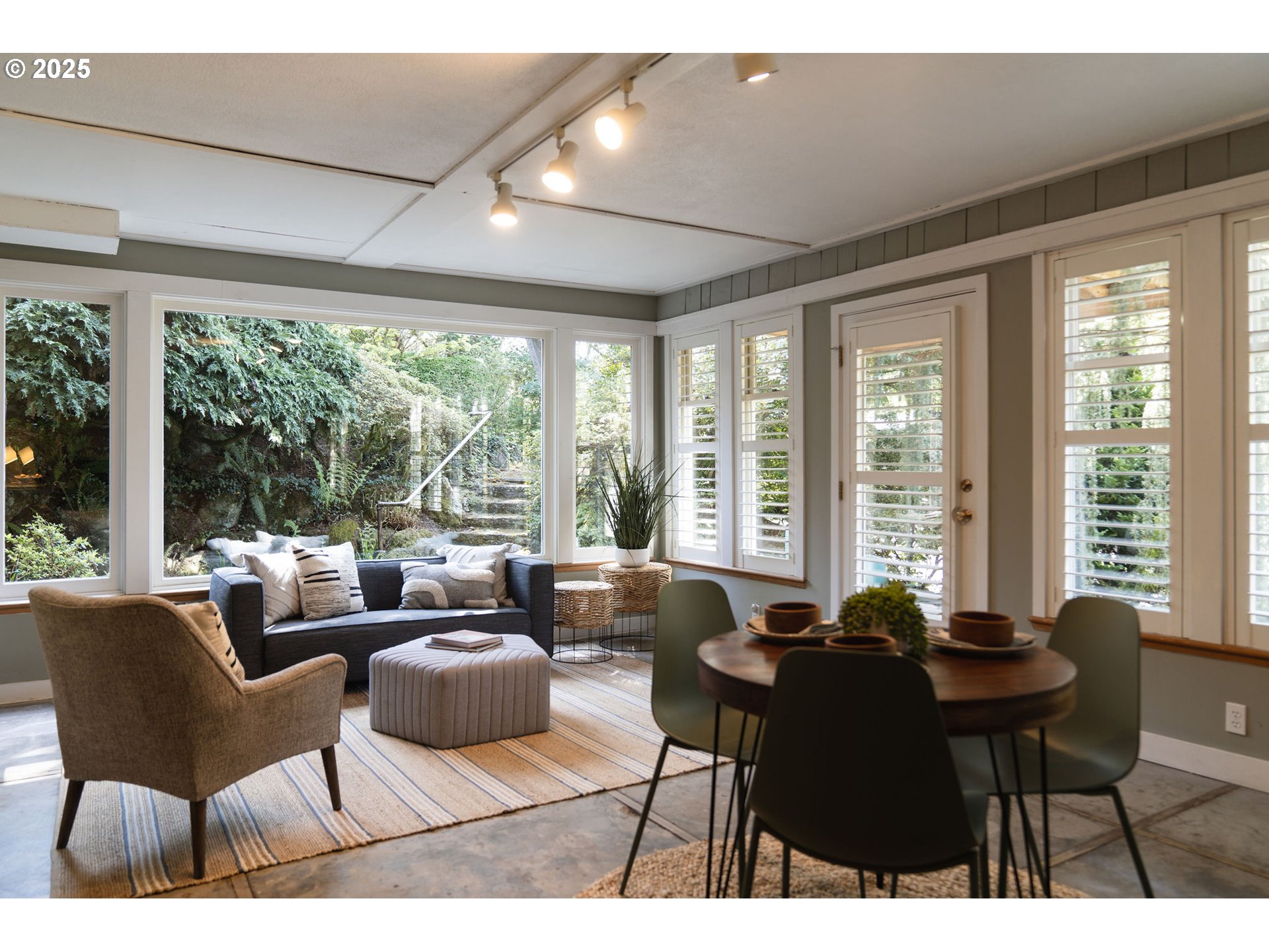3940 Southwest Council Crest Drive Portland, OR 97239 - Photo 39 of 48 a living room with furniture and large windows