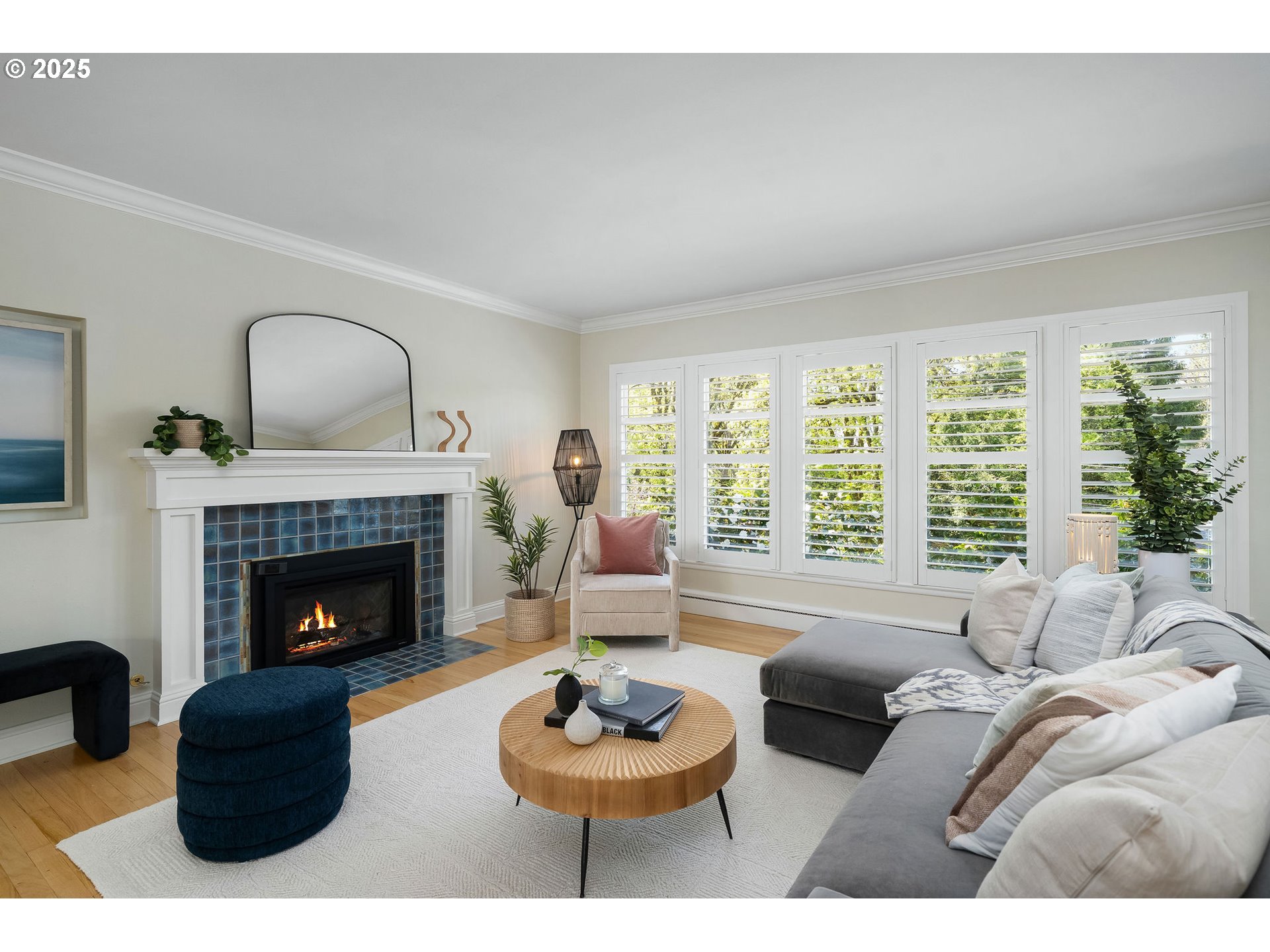 3940 Southwest Council Crest Drive Portland, OR 97239 - Photo 5 of 48 a living room with furniture and a fireplace