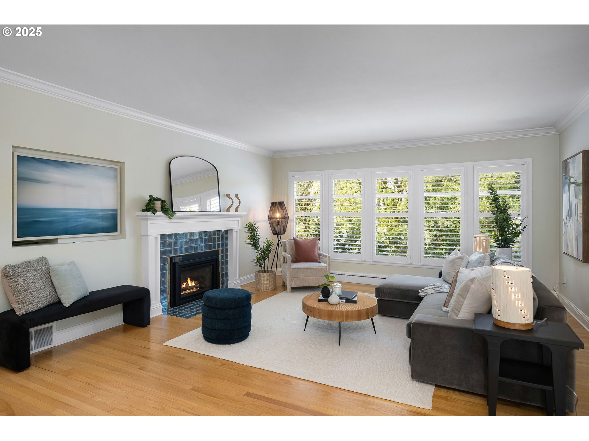3940 Southwest Council Crest Drive Portland, OR 97239 - Photo 6 of 48 a living room with furniture and a fireplace