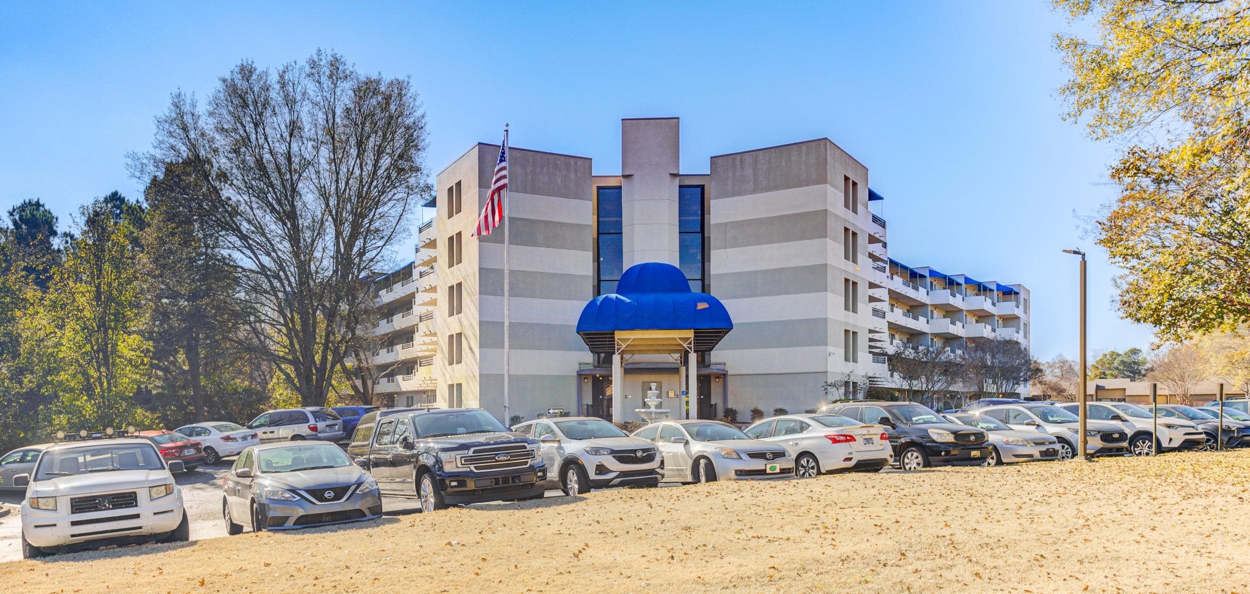 5013 Scheibler Road, Unit C1 Memphis, TN 38128 - Photo 35 of 36 a street view with couple of cars parked in front of house