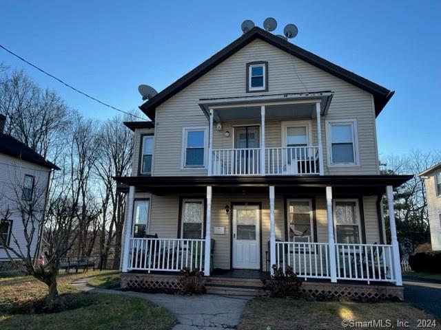 16 Summit Street Danbury, CT 06810 - Photo 1 of 1 a front view of a house with a yard