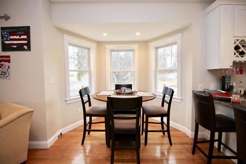 135 Argyle Road Braintree, MA 02184 - Photo 17 of 29 a dining room with furniture and wooden floor