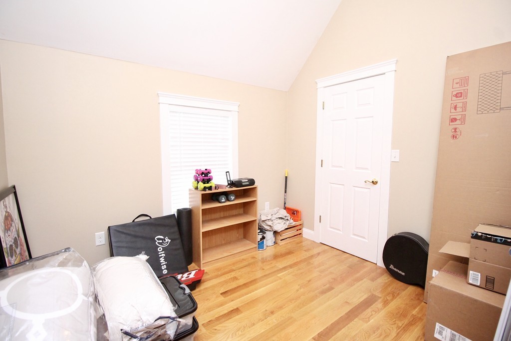 135 Argyle Road Braintree, MA 02184 - Photo 19 of 29 a bedroom with a bed and a desk