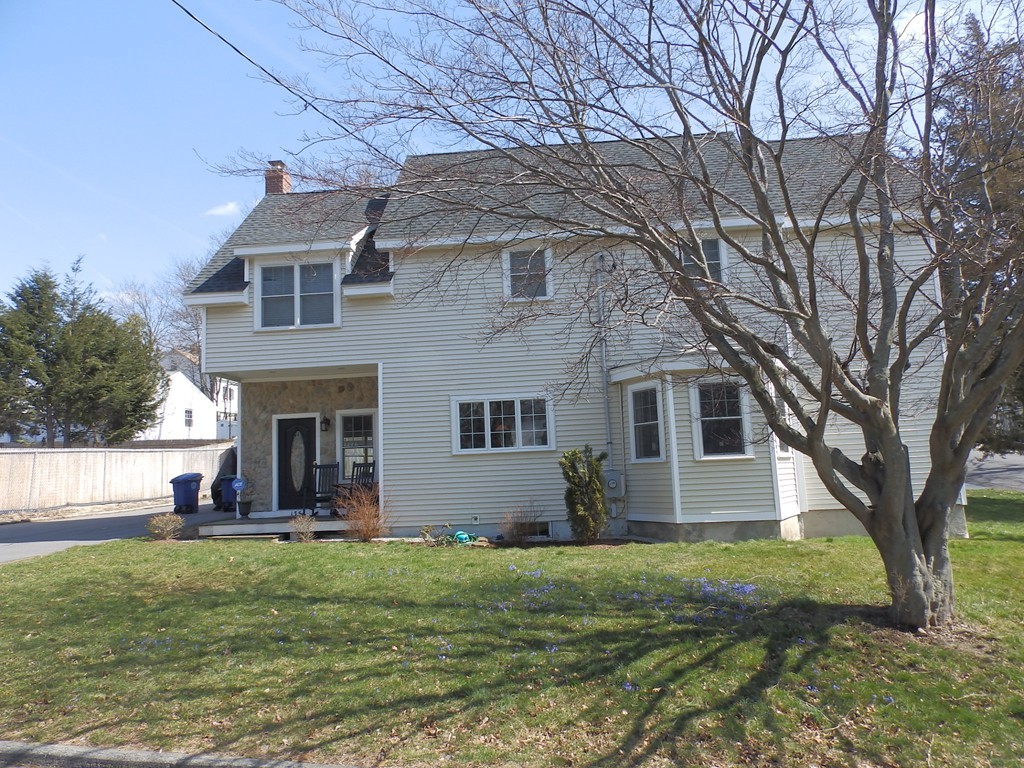 135 Argyle Road Braintree, MA 02184 - Photo 2 of 29 a front view of house with yard and green space