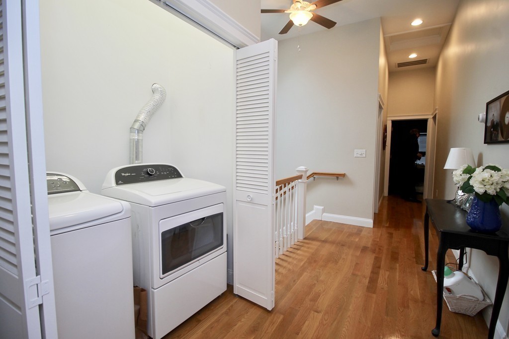135 Argyle Road Braintree, MA 02184 - Photo 21 of 29 a hallway with a washer and dryer