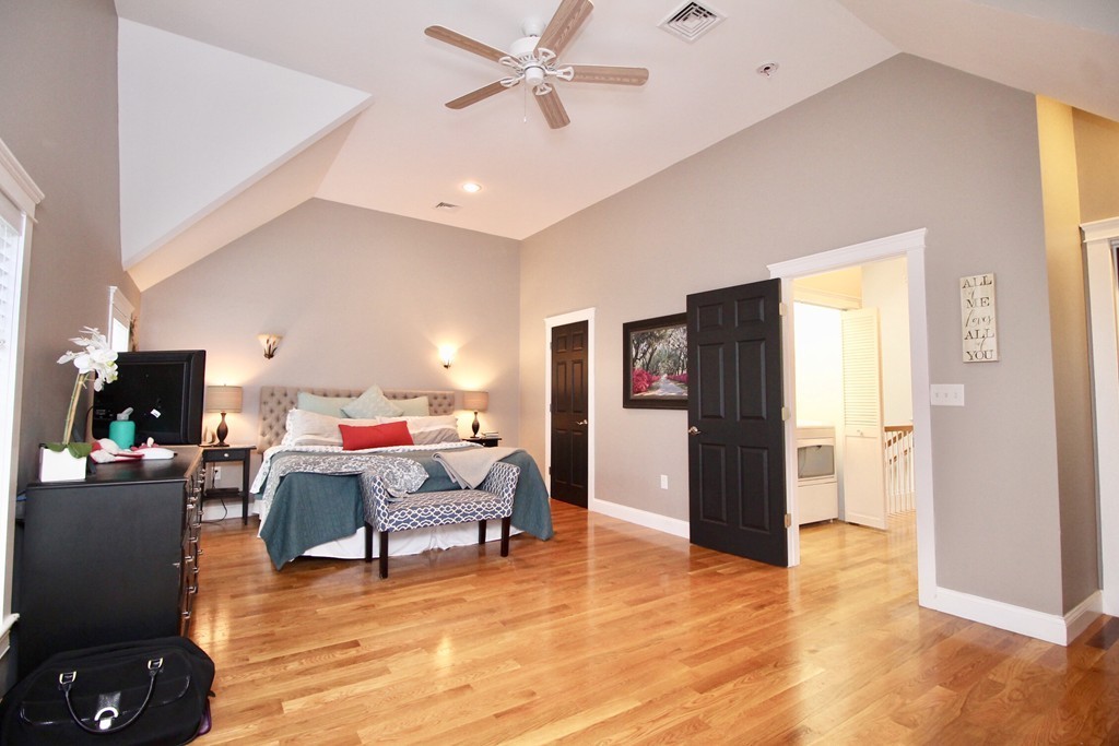135 Argyle Road Braintree, MA 02184 - Photo 22 of 29 a living room with furniture and a wooden floor