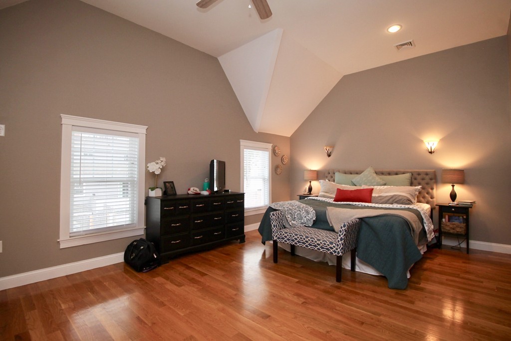 135 Argyle Road Braintree, MA 02184 - Photo 23 of 29 a spacious bedroom with a bed and a window