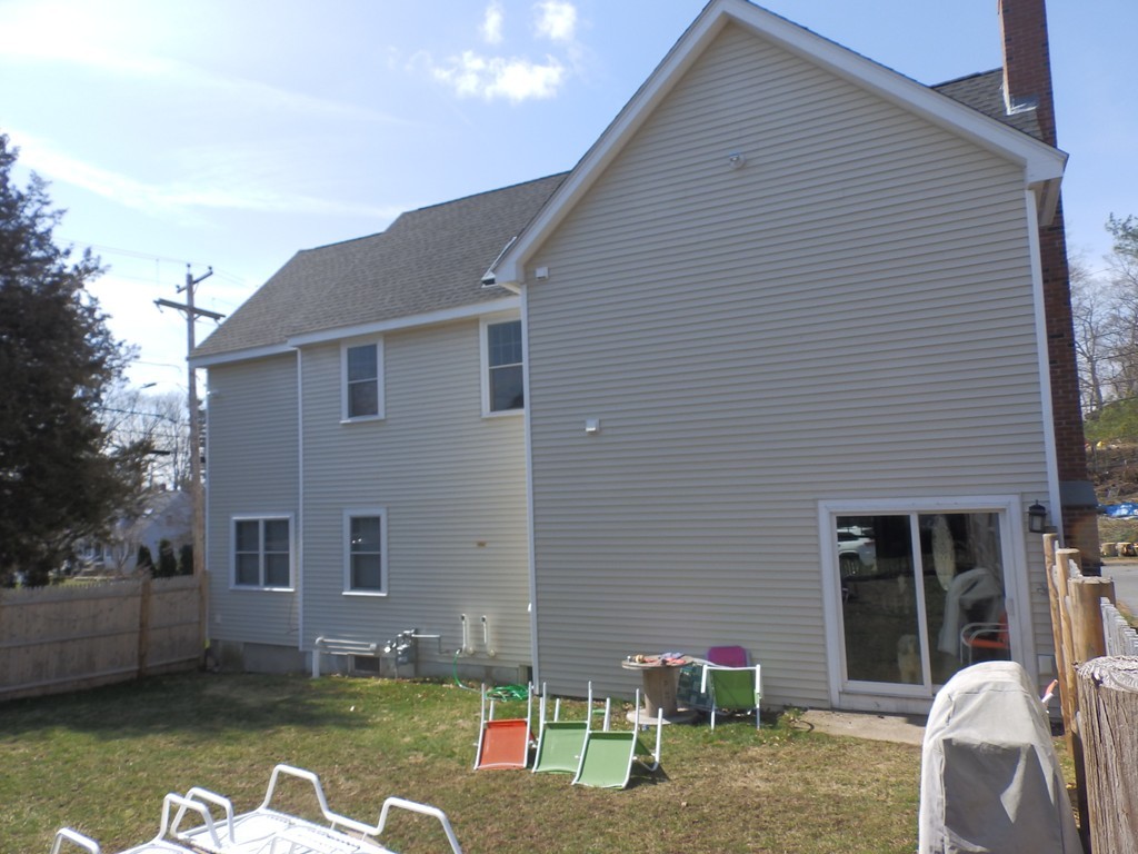 135 Argyle Road Braintree, MA 02184 - Photo 7 of 29 a front view of a house with garden