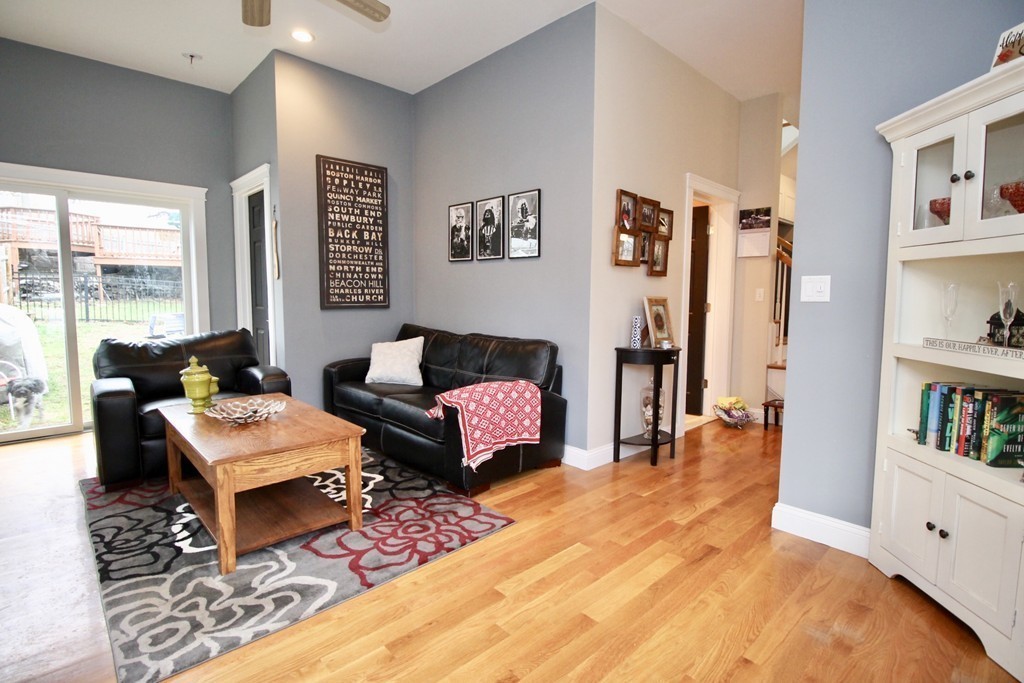 135 Argyle Road Braintree, MA 02184 - Photo 10 of 29 a living room with furniture and a book shelf