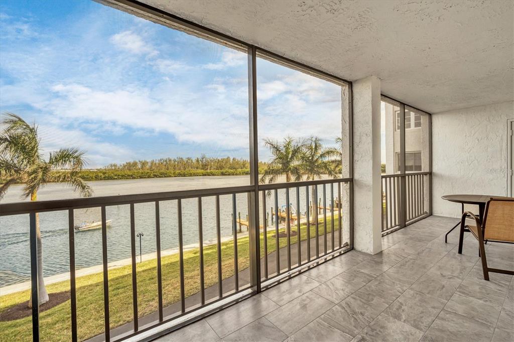 9393 Midnight Pass Road, Unit 302 Sarasota, FL 34242 - Photo 22 of 65 a view of a city from a balcony