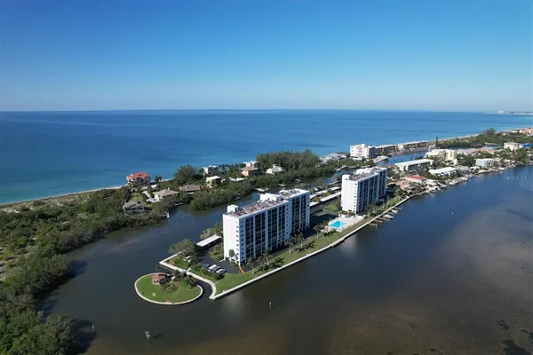 a view of a balcony with furniture
