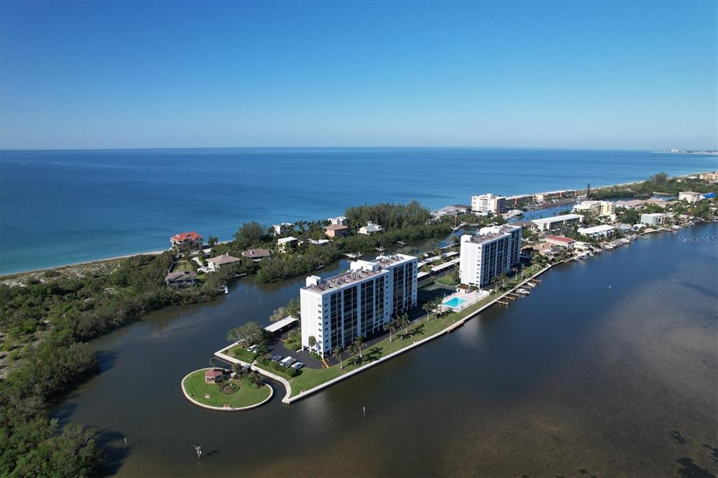 9393 Midnight Pass Road, Unit 302 Sarasota, FL 34242 - Photo 33 of 65 an aerial view of a house with ocean view