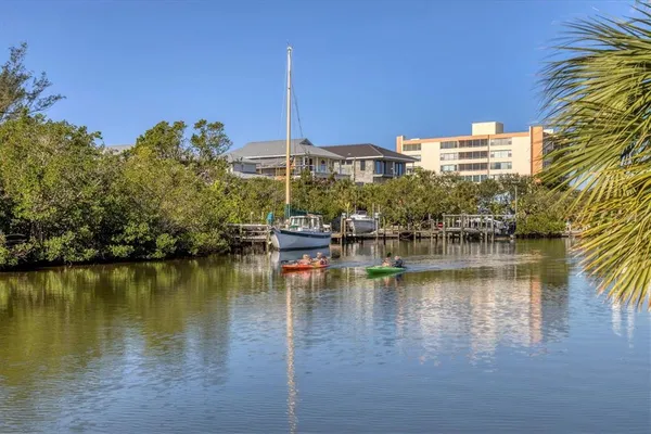 a view of a ocean with city from terrace
