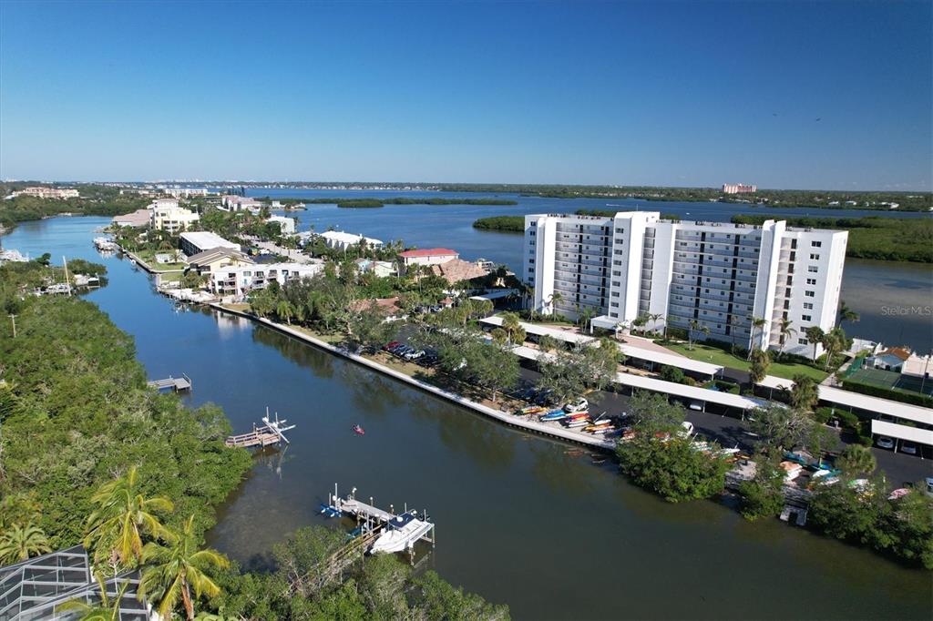 9393 Midnight Pass Road, Unit 302 Sarasota, FL 34242 - Photo 62 of 65 an aerial view of a city