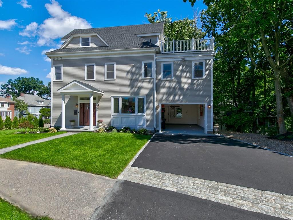 6 Kennard Road Brookline, MA 02445 - Photo 2 of 39 front view of house with a yard
