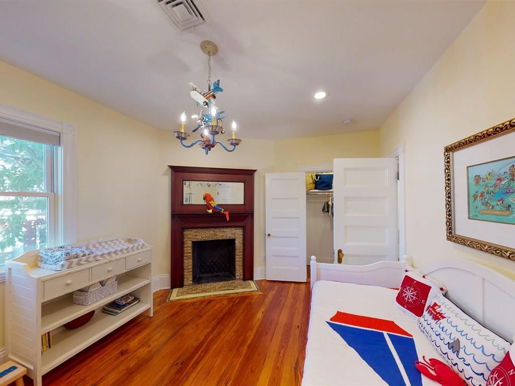 6 Kennard Road Brookline, MA 02445 - Photo 21 of 39 a living room with furniture and a fireplace