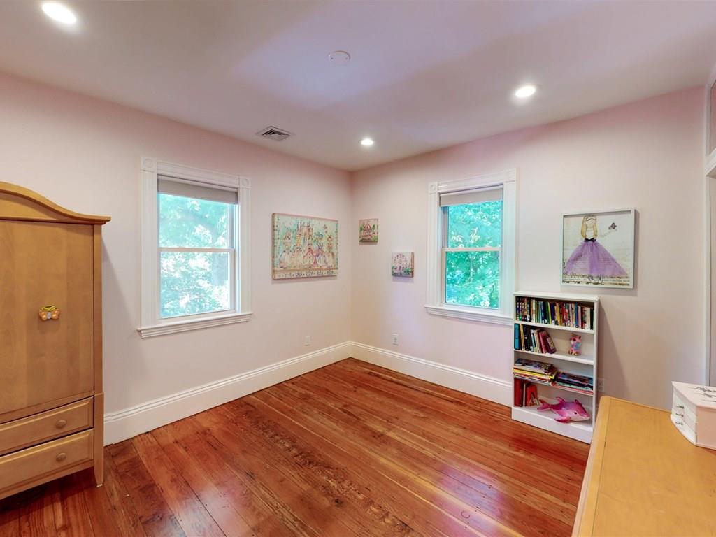 6 Kennard Road Brookline, MA 02445 - Photo 22 of 39 a view of room with window and wooden floor