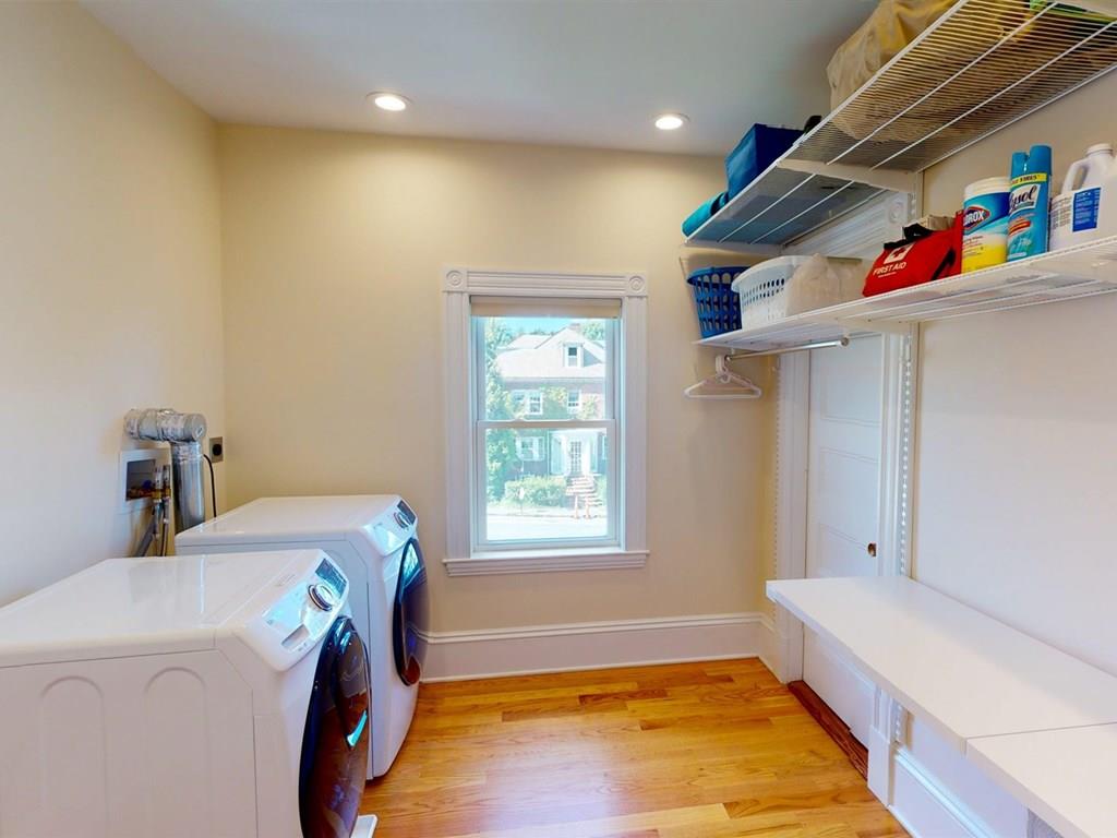 6 Kennard Road Brookline, MA 02445 - Photo 24 of 39 a room with a bed and a window