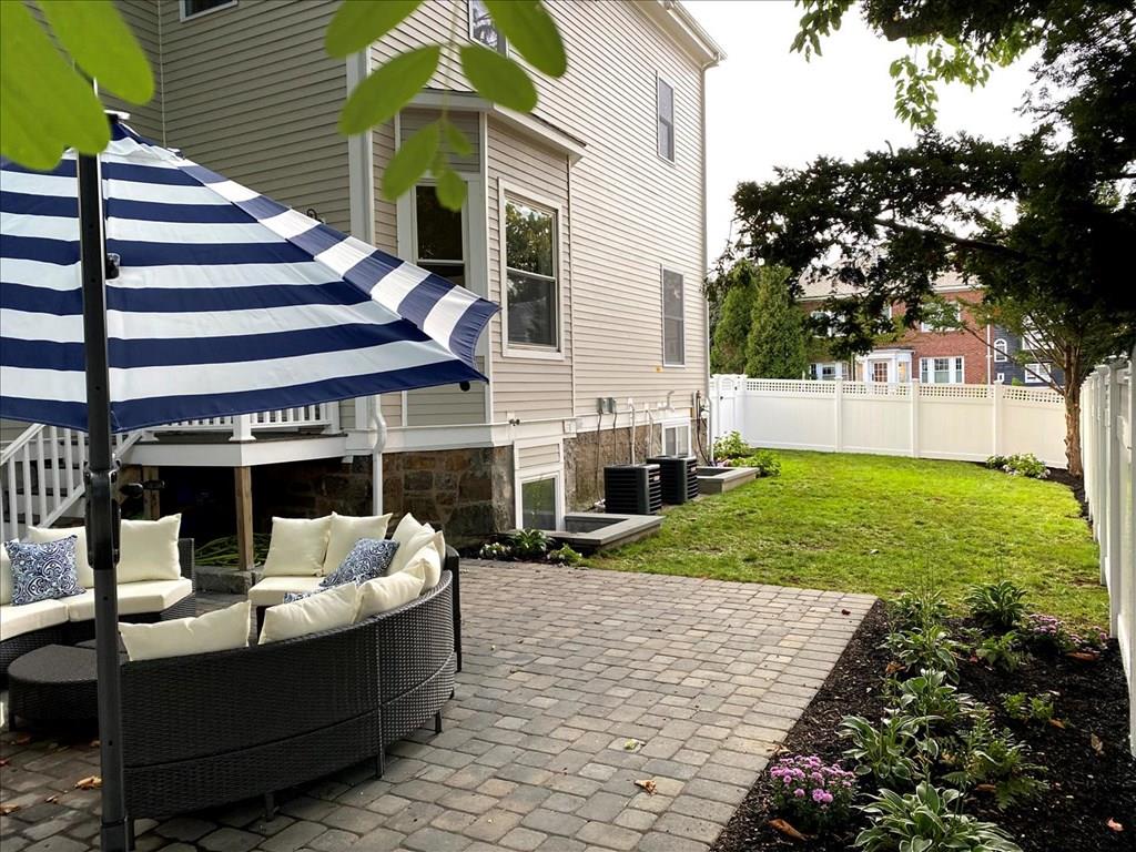 6 Kennard Road Brookline, MA 02445 - Photo 37 of 39 a view of a house with backyard and sitting area