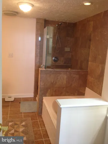 a bathroom with a bathtub