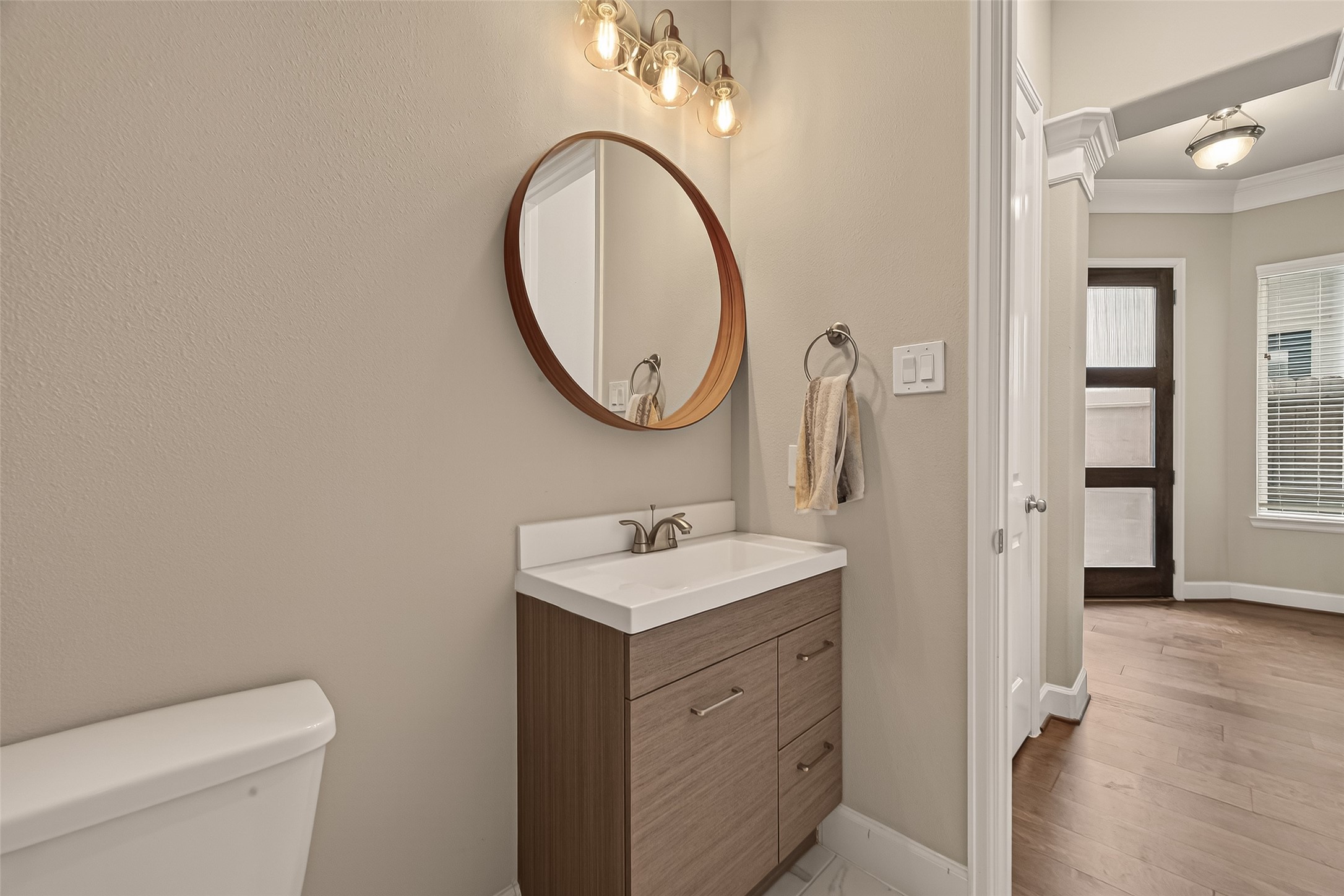 4413 Schuler Street, Unit B Houston, TX 77007 - Photo 23 of 46 a bathroom with a toilet sink and mirror