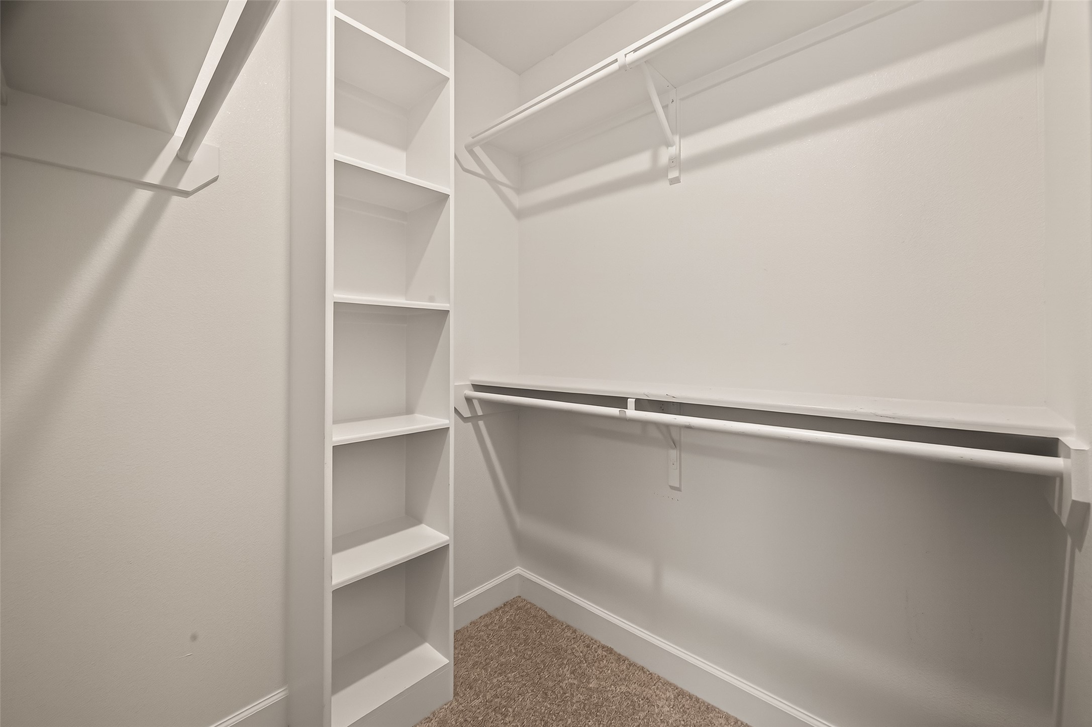 4413 Schuler Street, Unit B Houston, TX 77007 - Photo 27 of 46 a view of an empty walk in closet