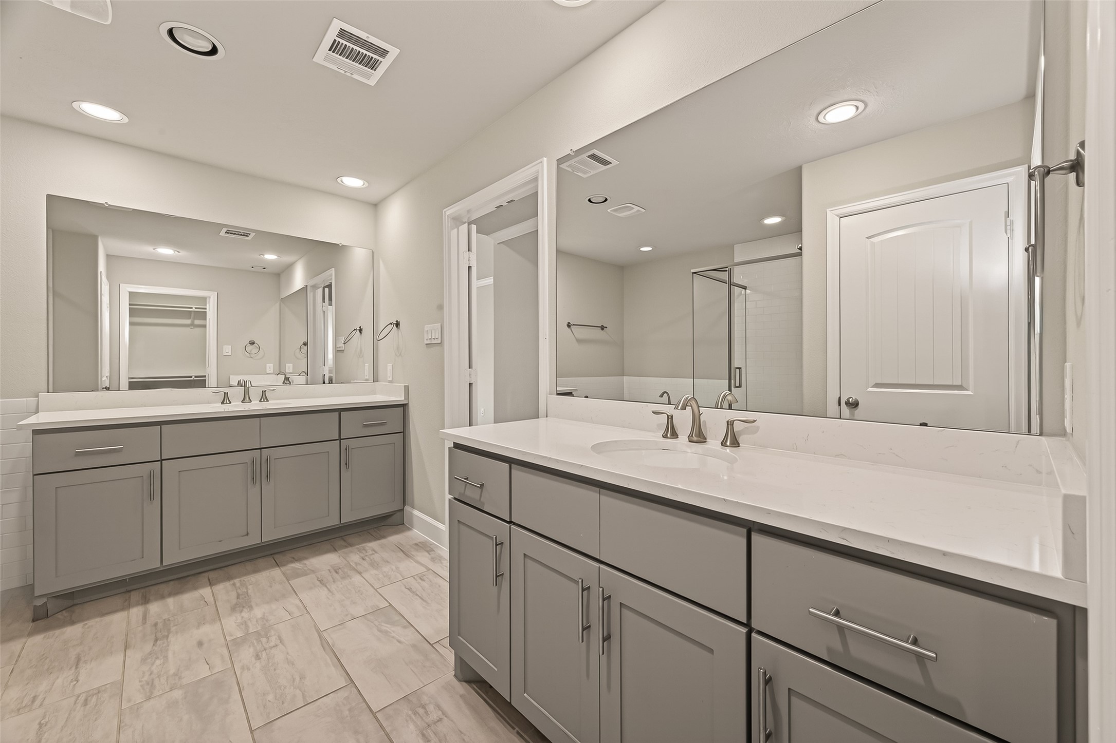 4413 Schuler Street, Unit B Houston, TX 77007 - Photo 41 of 46 a spacious bathroom with a granite countertop sink a mirror and a