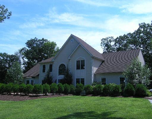 11 Equestrian Ridge Newtown, CT 06470 - Photo 1 of 1 a front view of house with yard and green space