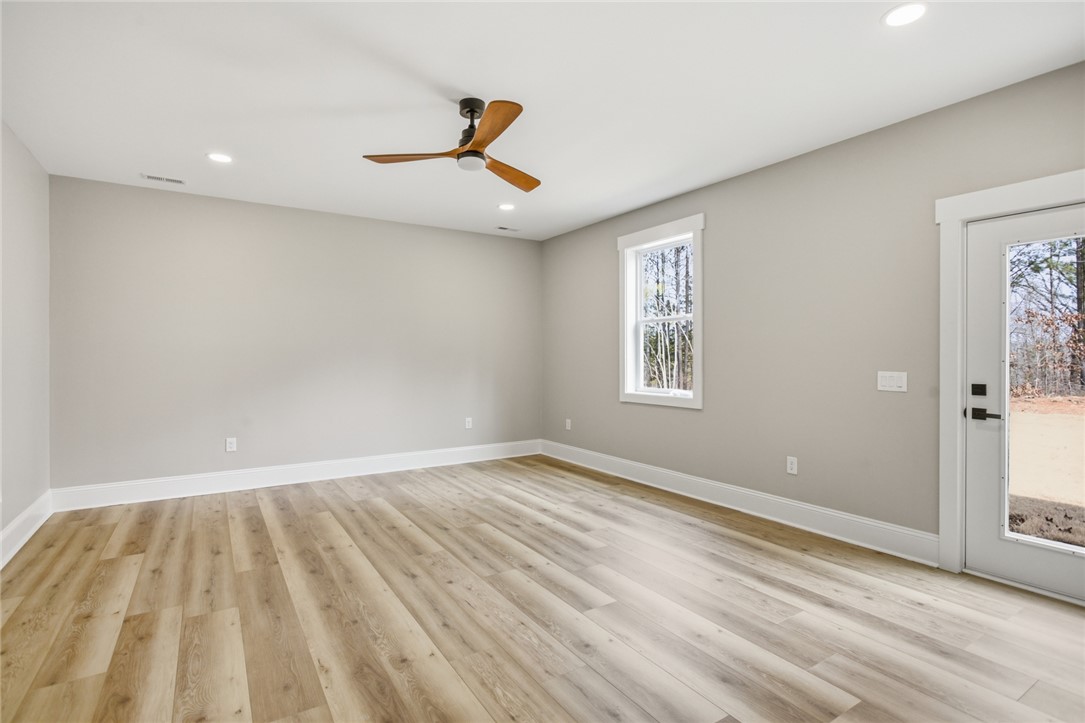 147 McAlister Road West Union, SC 29696 - Photo 26 of 49 This bright space features sleek flooring and a private entrance to the outdoors.Can be mudroom, office, extra sleeping room.