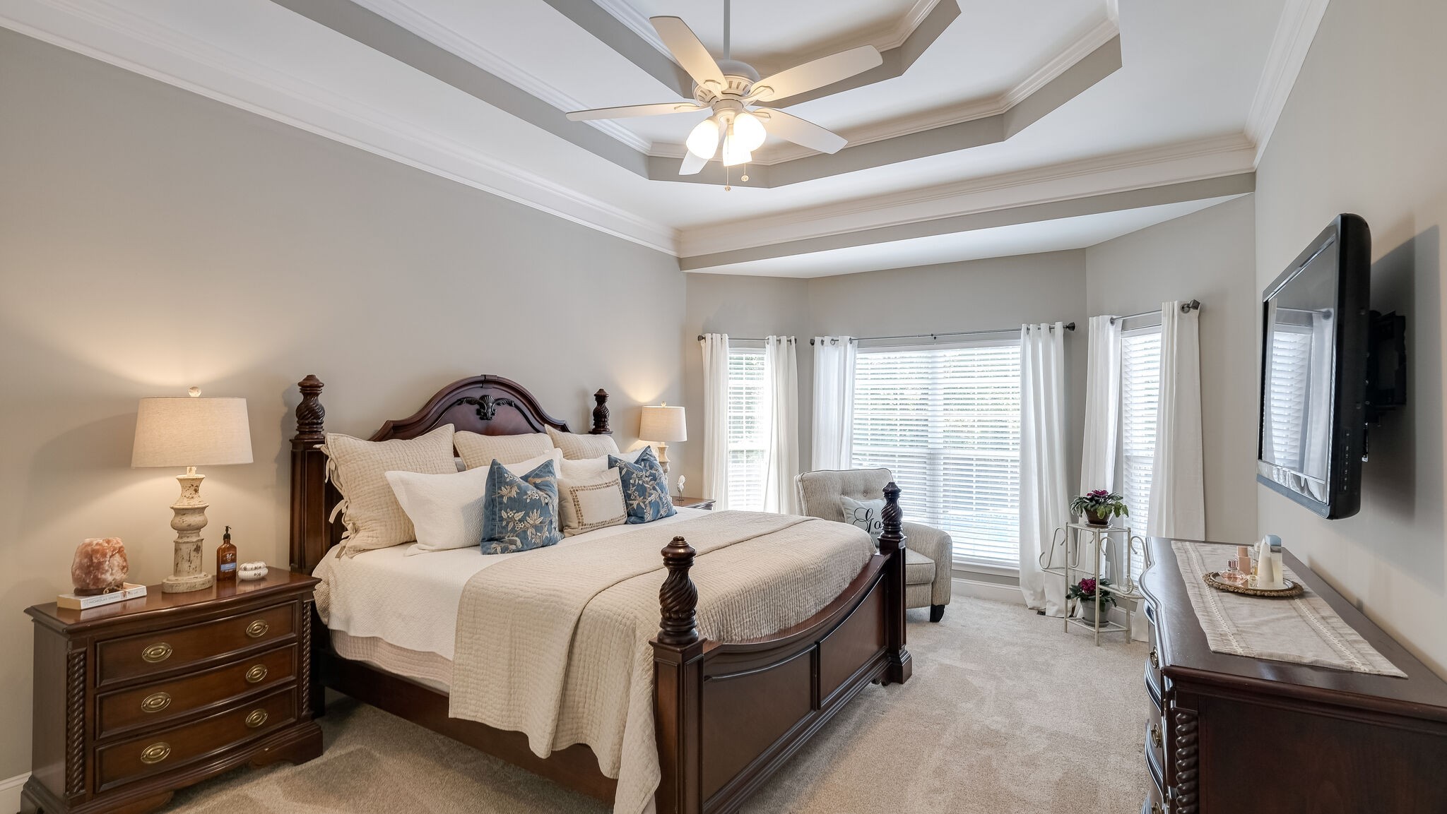 7005 Red Apple Road Antioch, TN 37013 - Photo 13 of 25 a bedroom with a bed and a flat tv screen on dresser