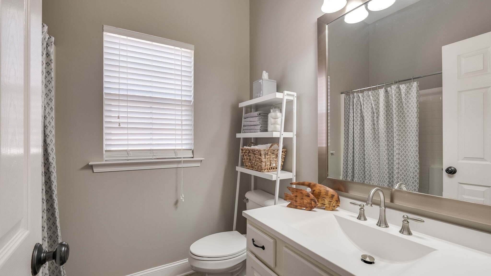 7005 Red Apple Road Antioch, TN 37013 - Photo 18 of 25 a bathroom with a sink a toilet and shower