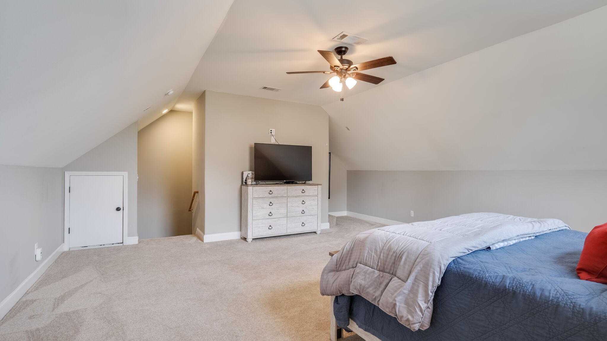 7005 Red Apple Road Antioch, TN 37013 - Photo 21 of 25 a bedroom with a bed and a flat screen tv