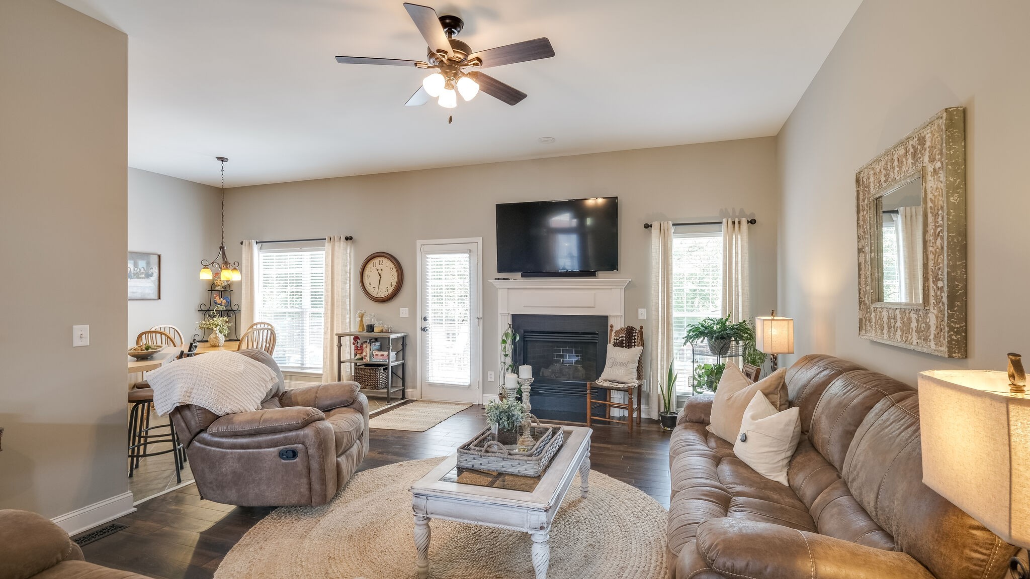 7005 Red Apple Road Antioch, TN 37013 - Photo 8 of 25 a living room with furniture fireplace and a flat screen tv