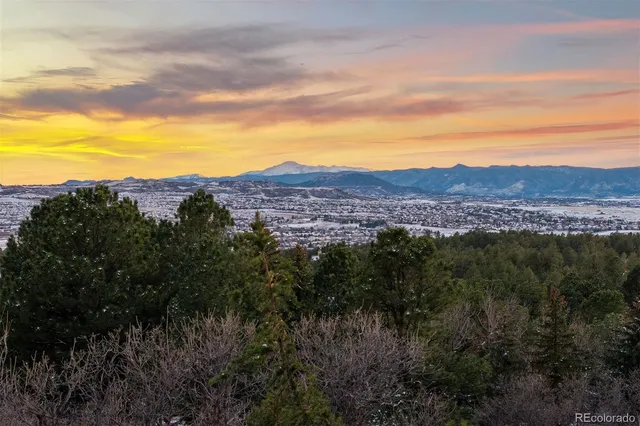 a view of a street with a building in the background