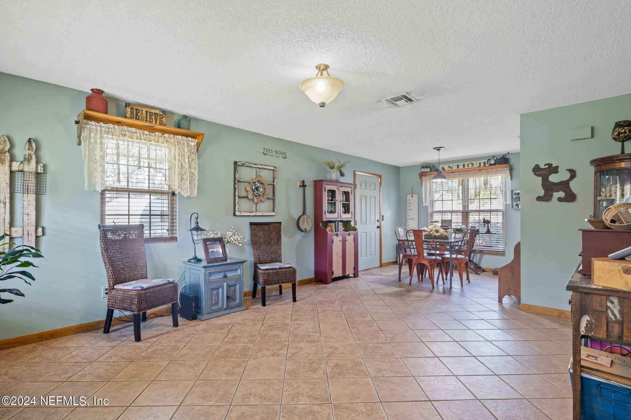 5641 Ricker Road Jacksonville, FL 32244 - Photo 11 of 33 a view of a livingroom with furniture and a window