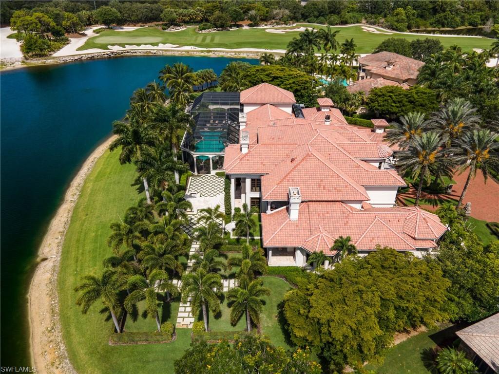 14928 Celle Way Naples, FL 34110 - Photo 15 of 35 an aerial view of a house with a lake view