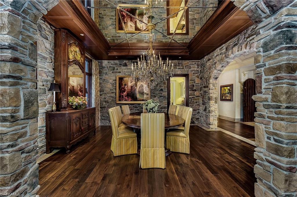 14928 Celle Way Naples, FL 34110 - Photo 20 of 35 a view of a chairs and a table in the balcony