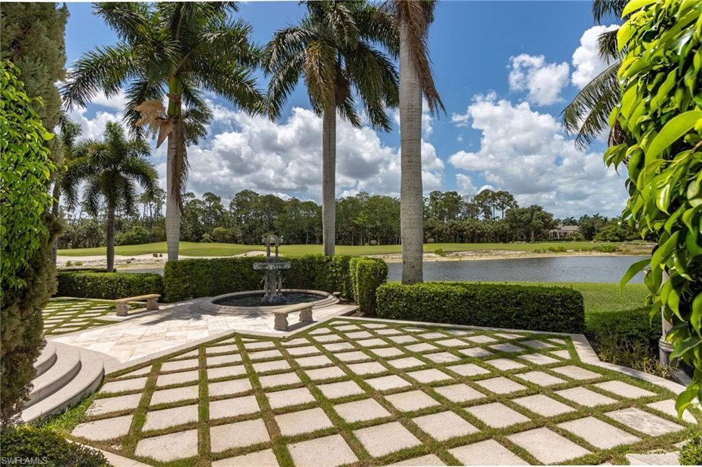 14928 Celle Way Naples, FL 34110 - Photo 6 of 35 a view of a garden with lake view