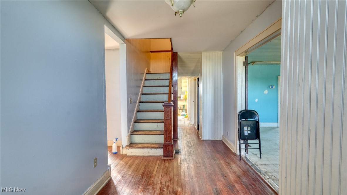 4896 High Hill Road Cambridge, OH 43725 - Photo 2 of 48 Stairway with wood floors